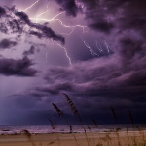 Close-up of industrial utility boxes and piping on a brick wall in Texarkana