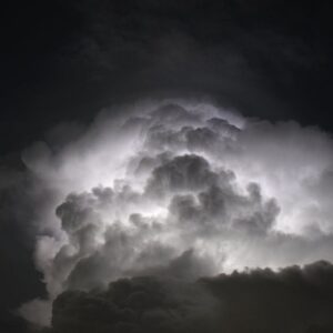 Dramatic lightning bolt over the ocean at night